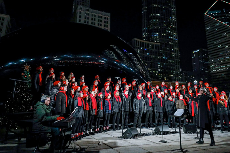 The Chicago Children's Choir leads a holiday sing-along at Cloud Gate