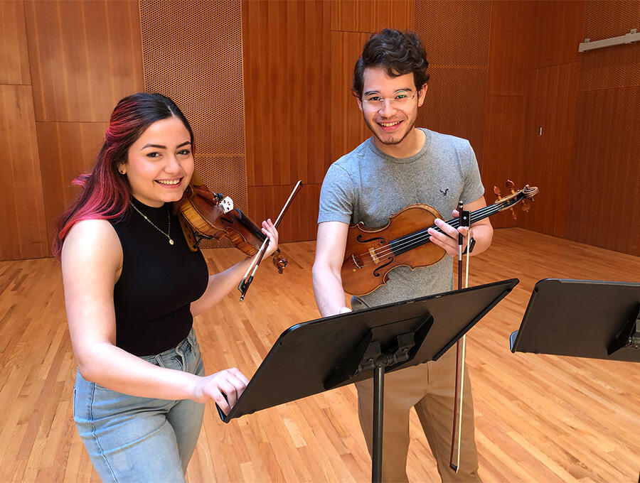 Project Inclusion fellows Gabriela Lara and Jesus Linarez settle into the Choral Rehearsal Room at the Jay Pritzker Pavilion