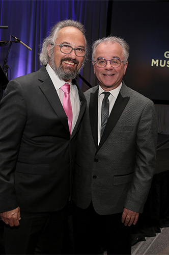 Carlos Kalmar pictured with chorus director Christopher Bell