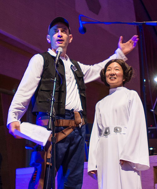 Festival Board Chair Adam Grais onstage with Amy Boonstra at a Star Wars Costume Party