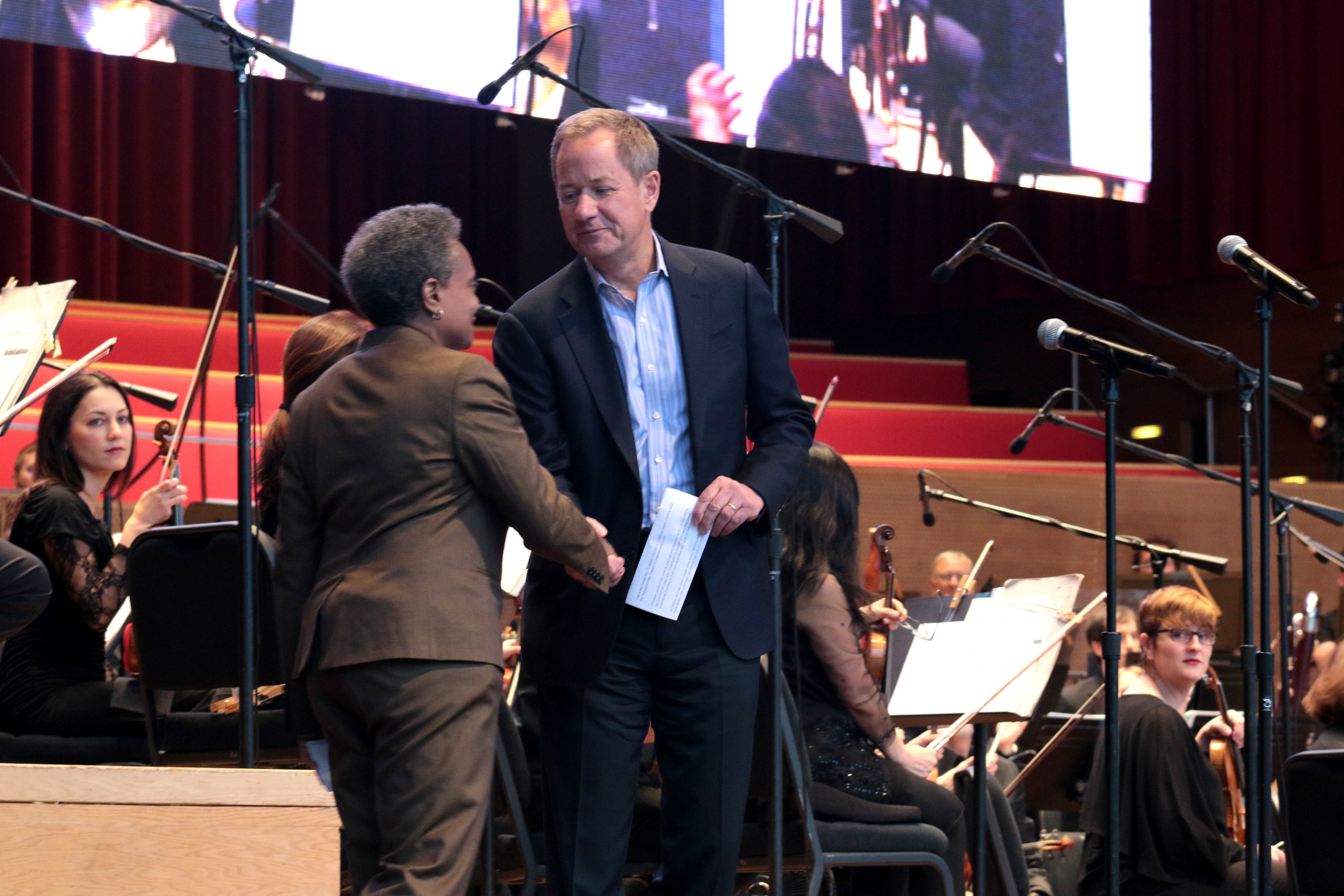 Steve Smith greets Chicago Mayor Lori Lightfoot