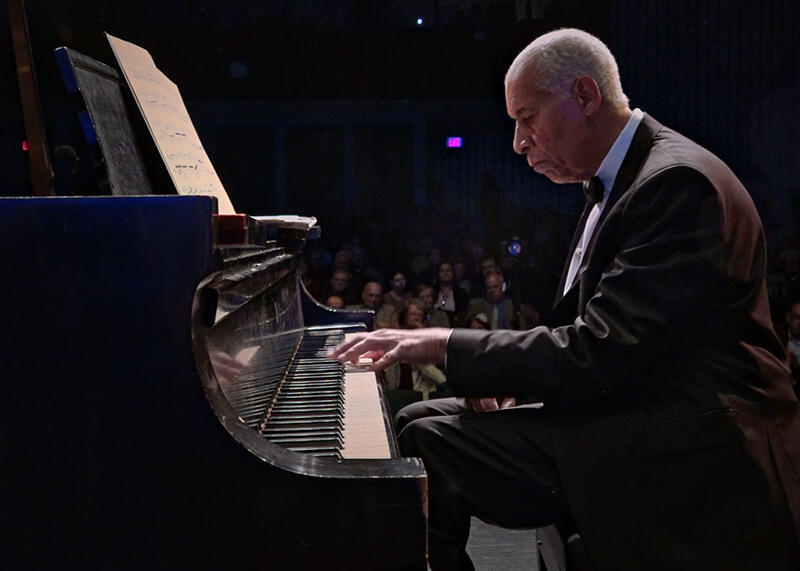 Norman Malone performs Maurice Ravel's Piano Concerto for the Left Hand