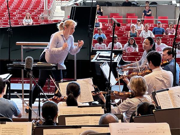 Guest conductor Gemma New and pianist Joyce Yang rehearse with the Grant Park Orchestra  before Park visitors in July