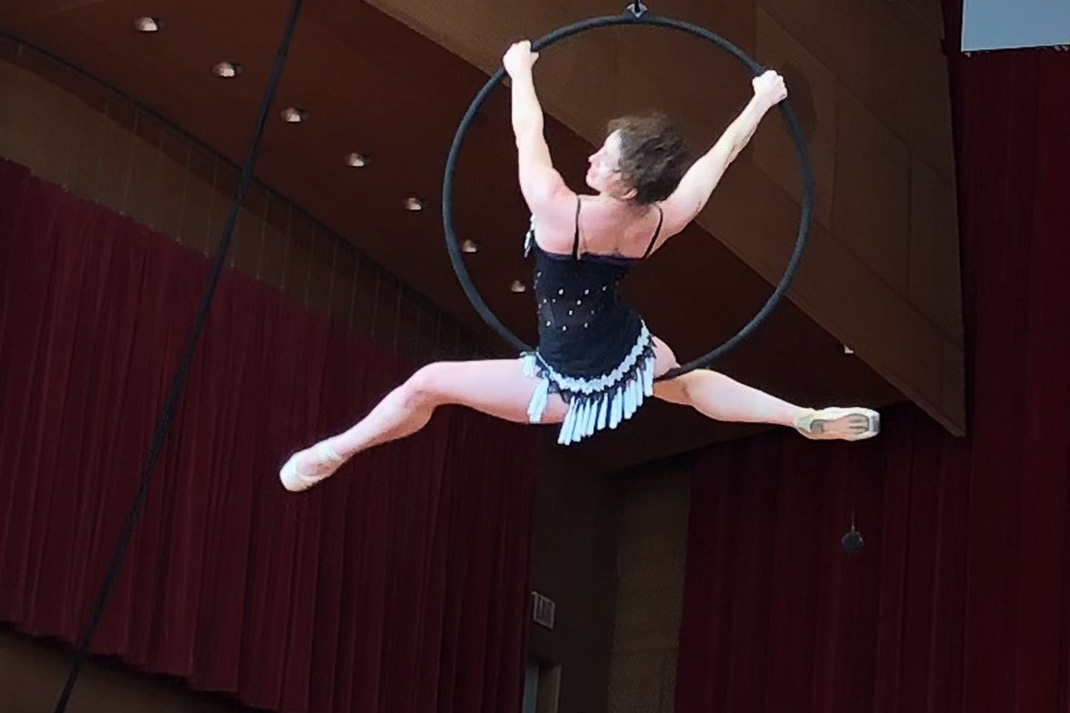 Troupe Vertigo performs acrobatic wonders above the Grant Park Orchestra