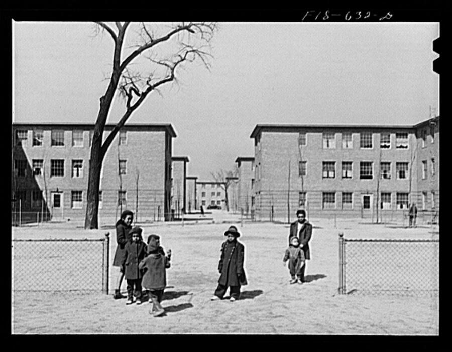 Children gather outside the Ida B Wells Housing Project in 1942