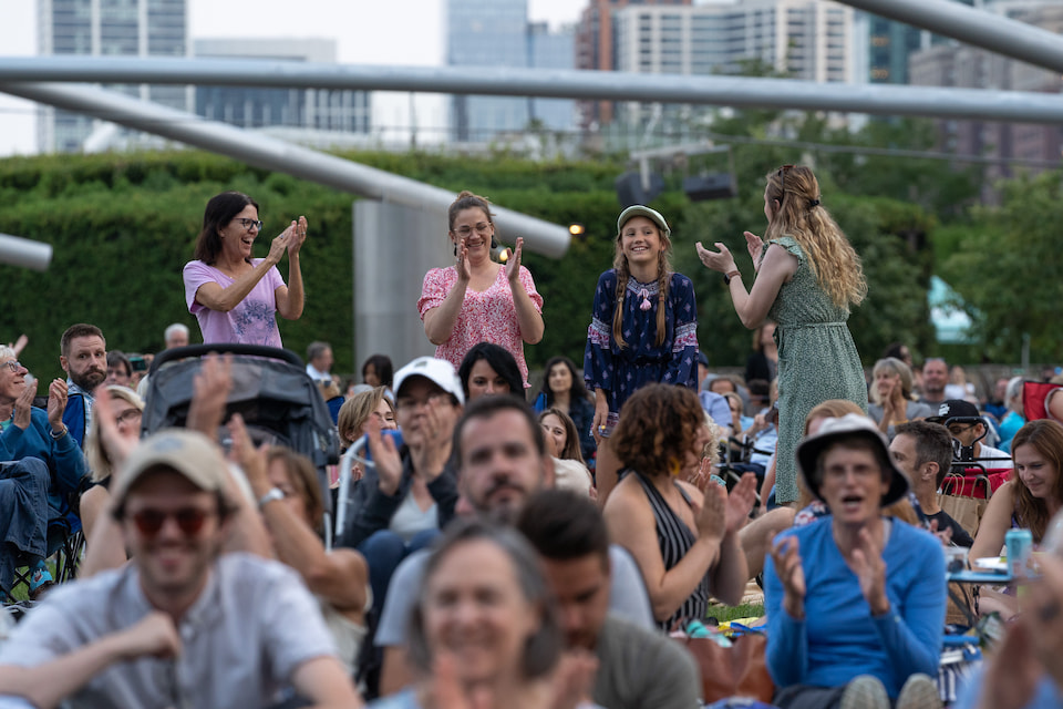 Crowd of people watching a concert at the Grant Park Music Festival